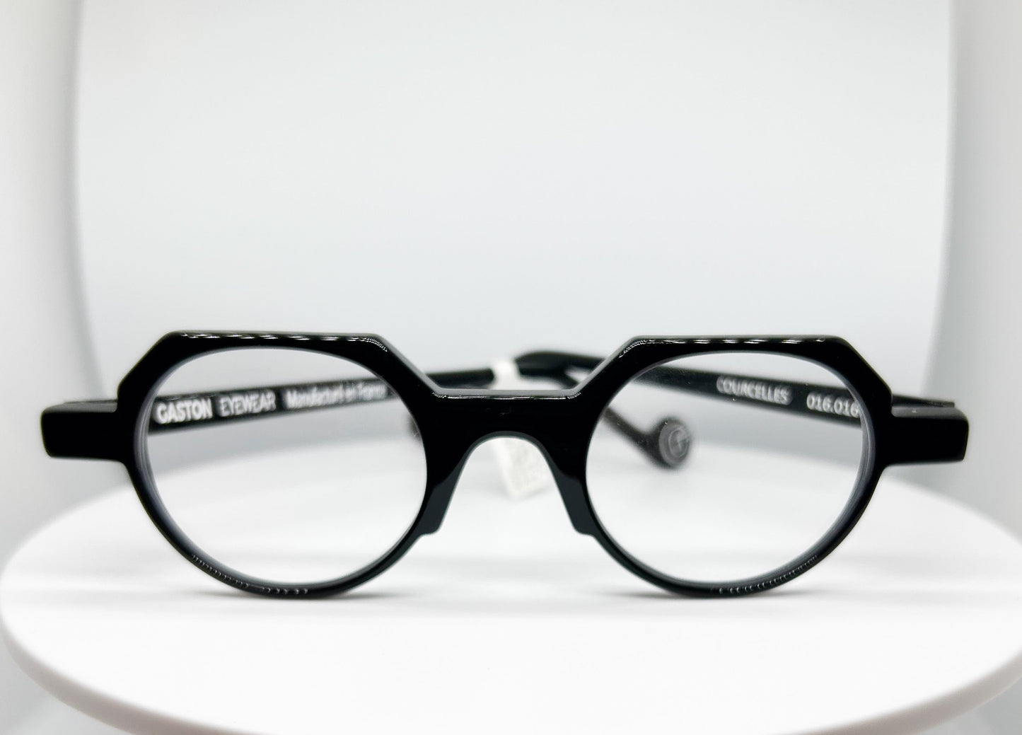 Buy Gaston Eyewear - Courcelles, a Black; Acetate Optical Frame with a Round with Flat Top shape. An Authorized Dealer, Adair Eyewear has a 40+ Years History of Customer Service Excellence