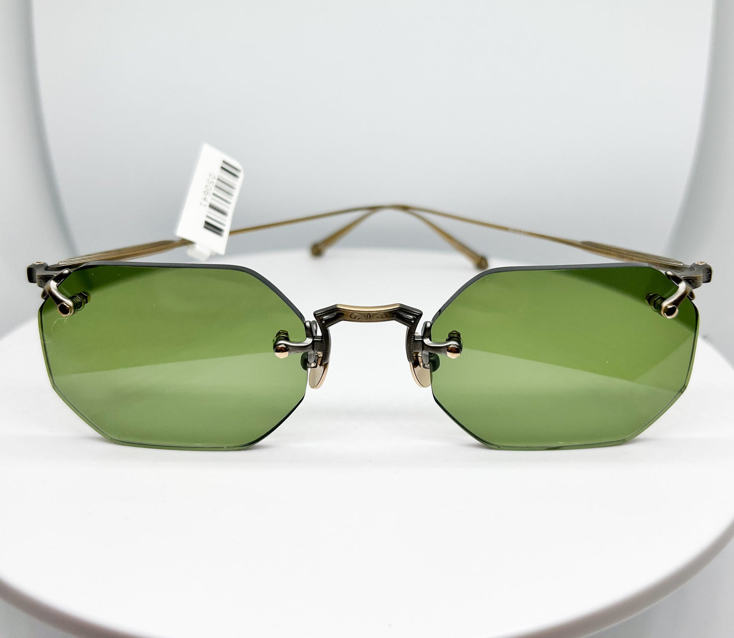 <p>Matsuda M3104 is a  Green, Antique Gold, Rimless Sunglasses Frame with a Rectangular shape.</p><p>Shop with confidence from Adair Eyewear, a MATSUDA Authorized Dealer.  We have provided the best in customer service and great designer eyweear for over 40 years.</p>